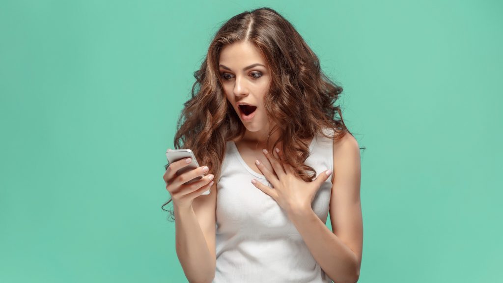 sexting online suprised woman
